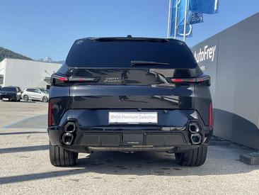 BMW XM 50e — photo 18