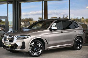 BMW iX3 — photo 33