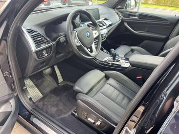 BMW iX3 — photo 18