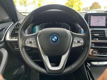 BMW iX3 — photo 24
