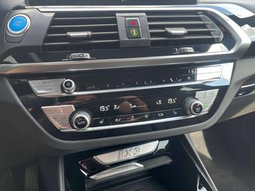 BMW iX3 — photo 31