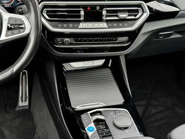 BMW iX3 — photo 11