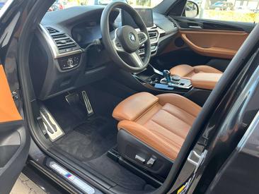 BMW iX3 — photo 17