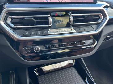 BMW iX3 — photo 29