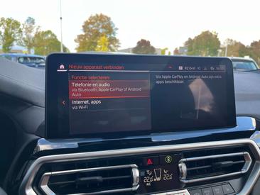 BMW iX3 — photo 34