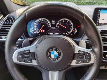 BMW X4 M40d — photo 28
