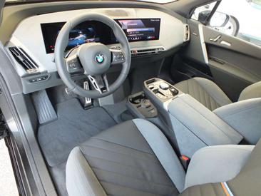 BMW IX XDrive45 — photo 21