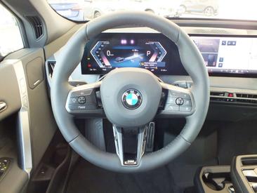 BMW IX XDrive45 — photo 23