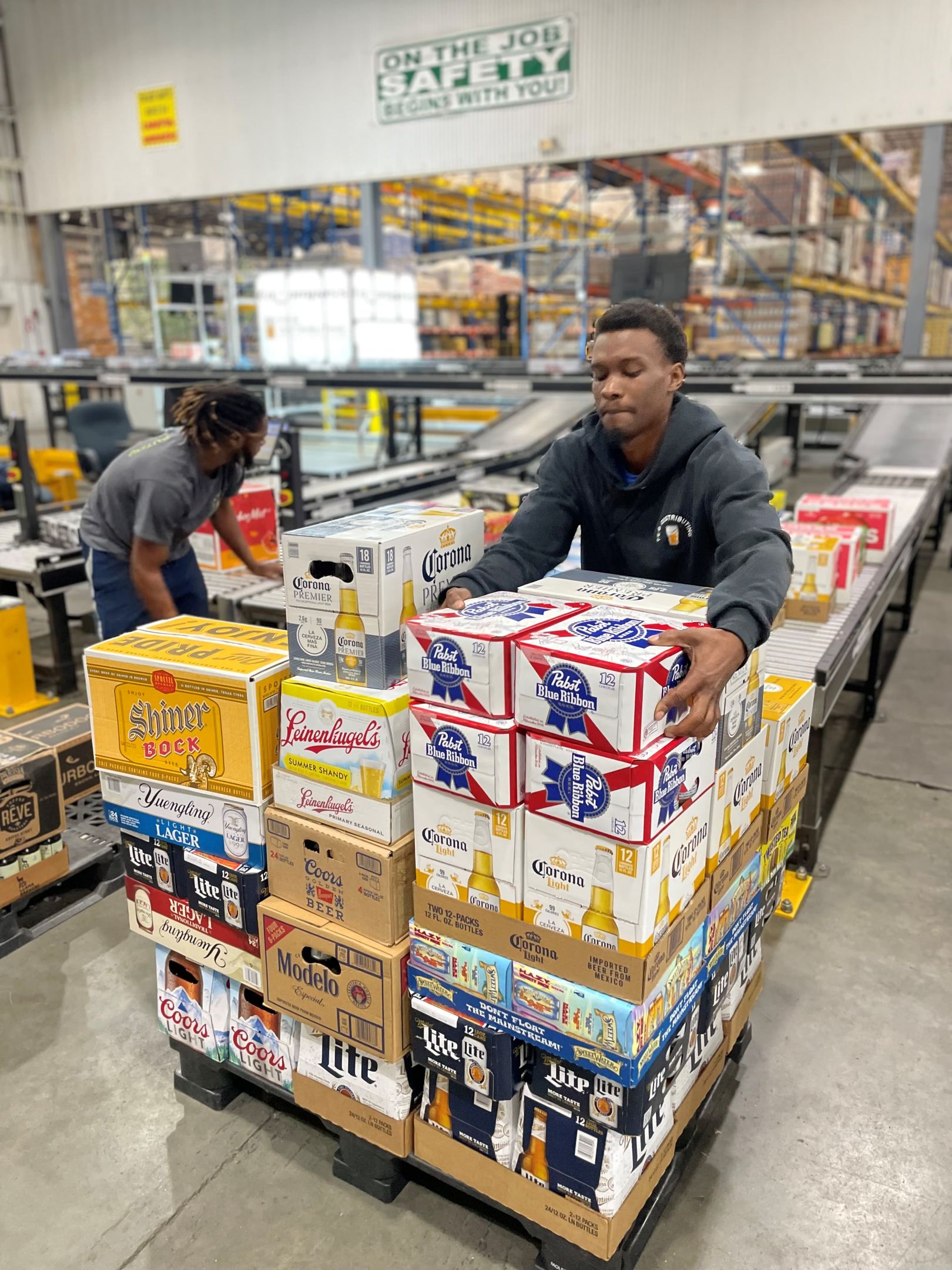 F.E.B. Warehouse Worker Stacking Beer