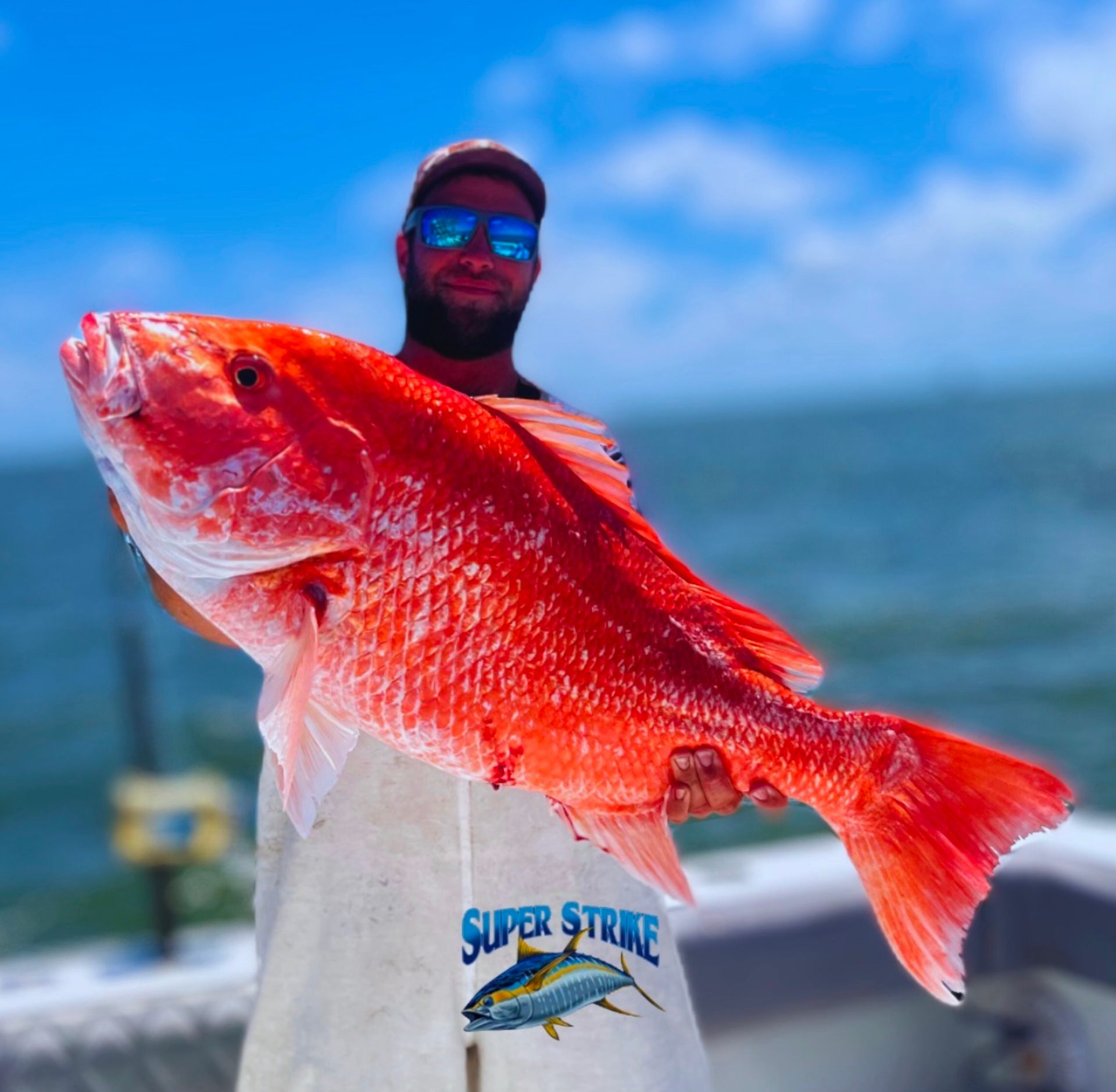 guy-holding-massive-red-snapper.jpg