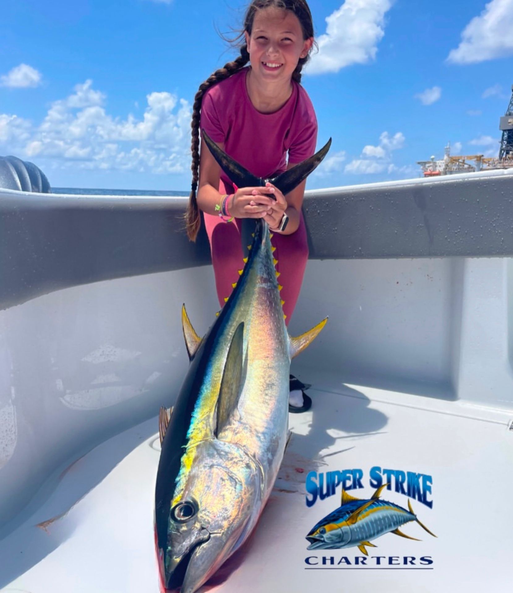 little-girl-caught-big-tuna.jpg