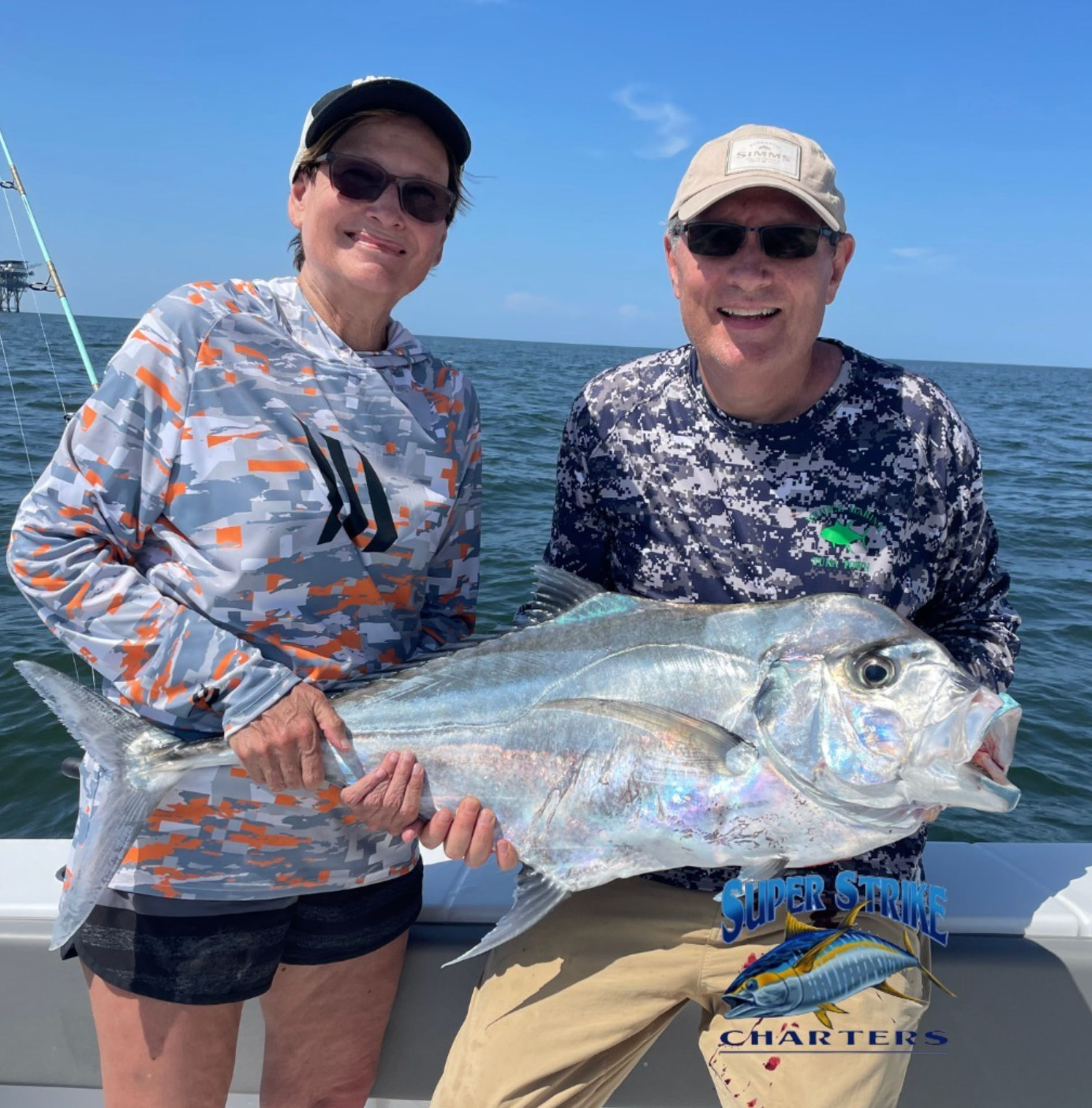 couple with big fish