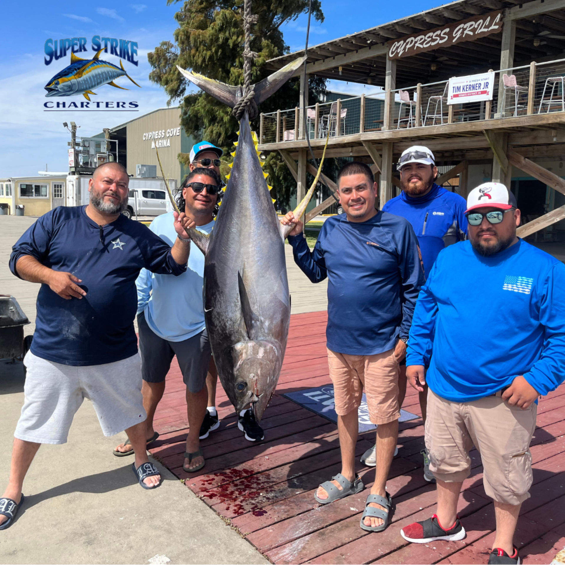 166 pound tuna hanging up