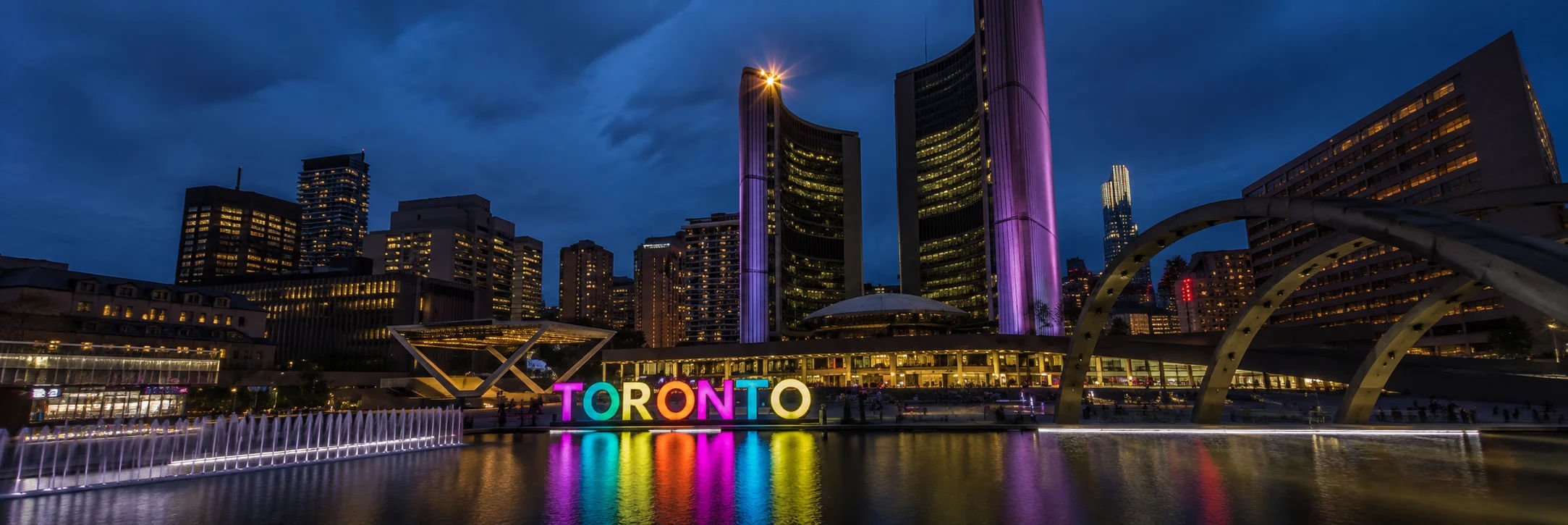Toronto skyline at dusk representing PTE Core exam preparation for Canadian immigration