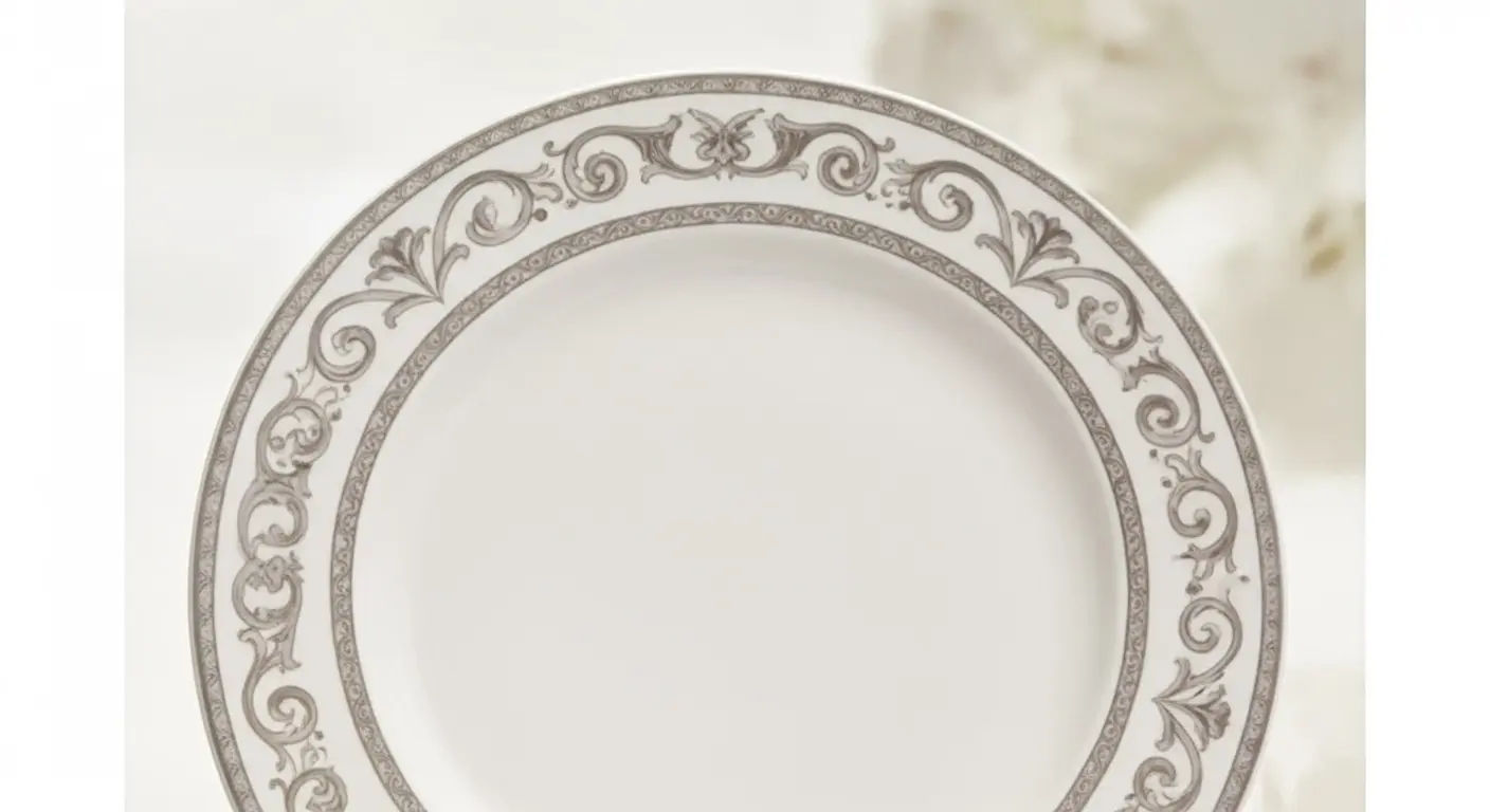 close-up of a bone china plate held to light showing translucency. Image alt text: Bone china translucency close-up.