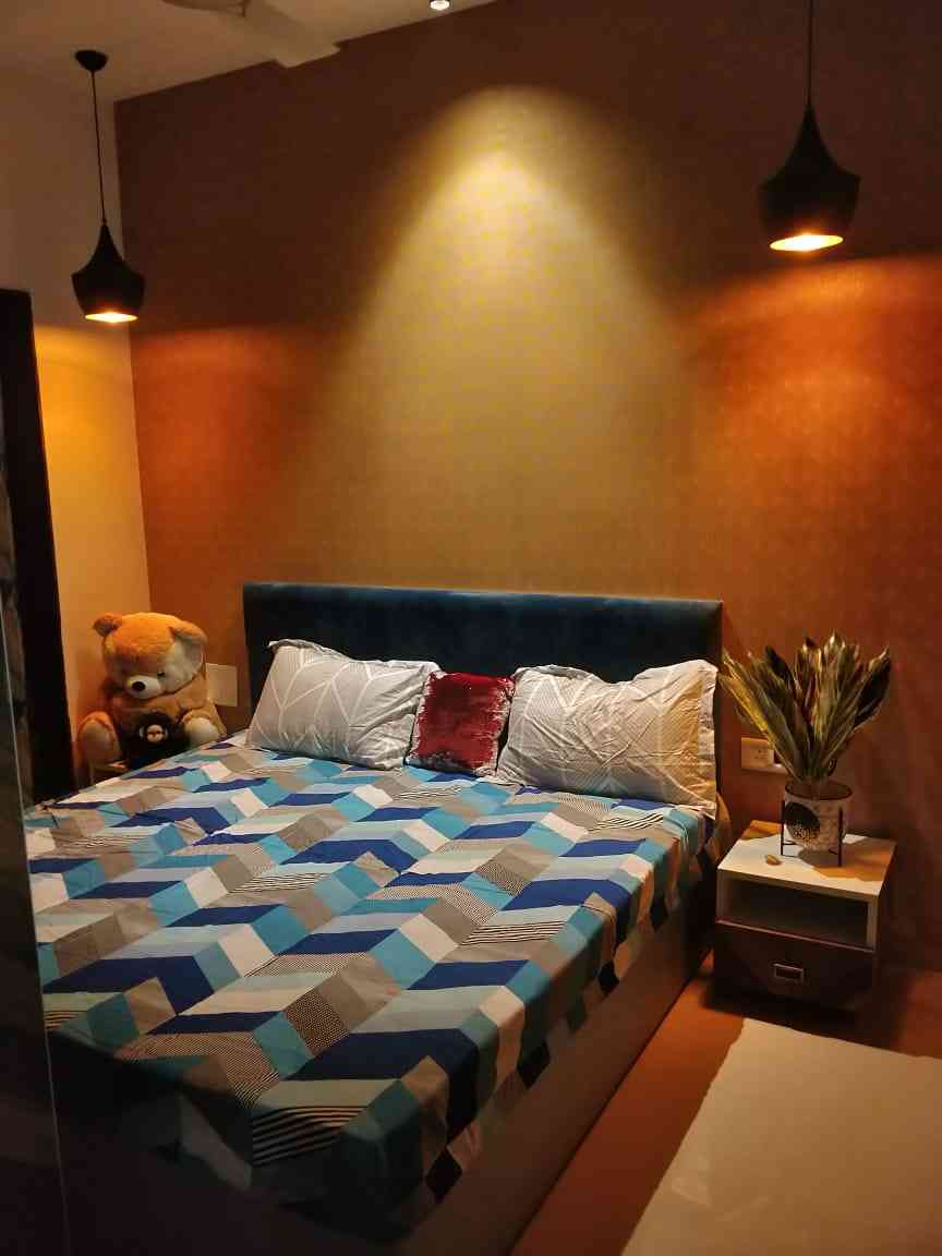 Bedroom Design With Hanging Lamps