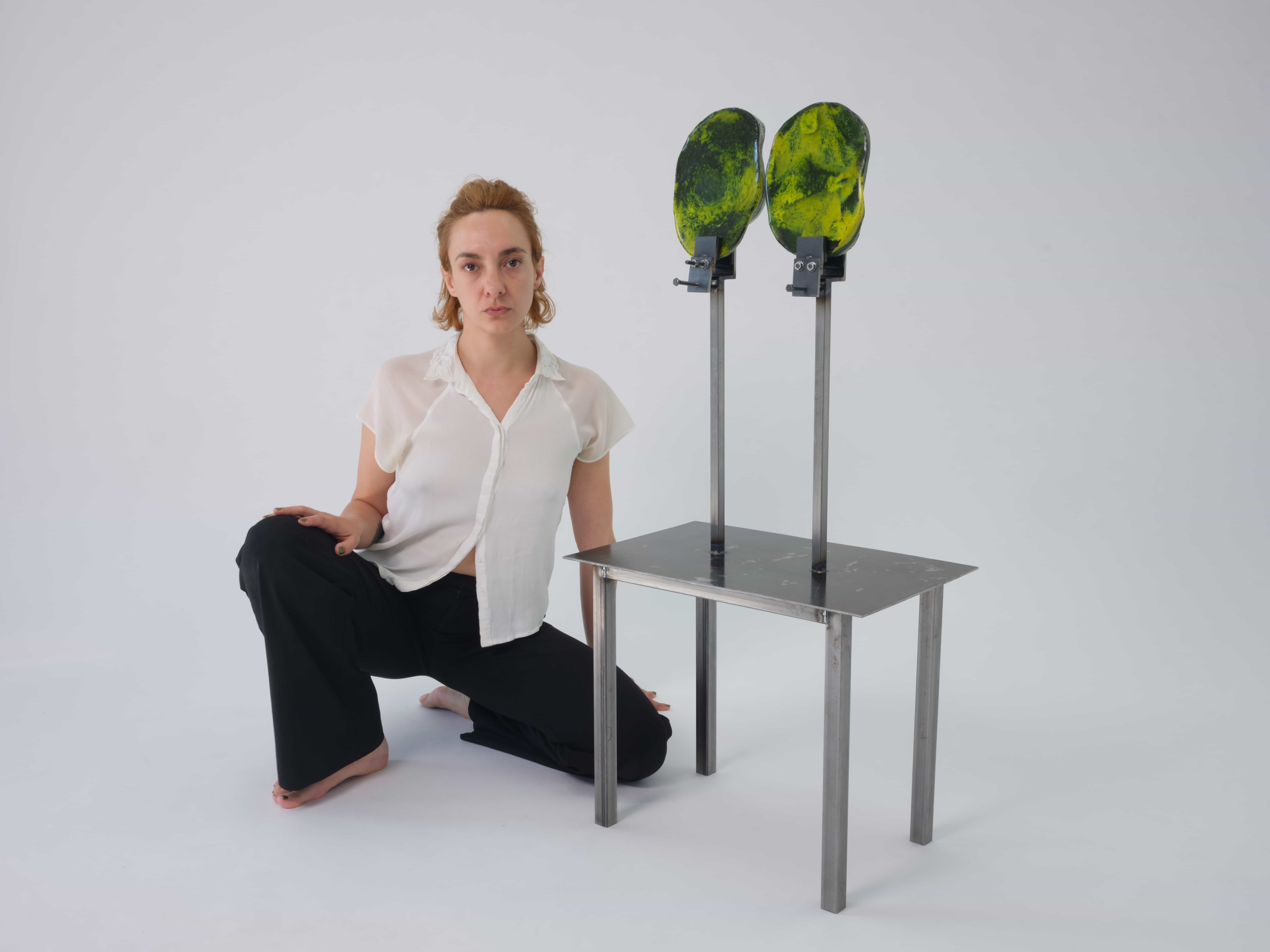 St Agatha - glass sculpture with Julie Dusuel squatting beside