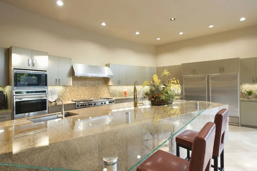 White quartz kitchen countertop with waterfall island