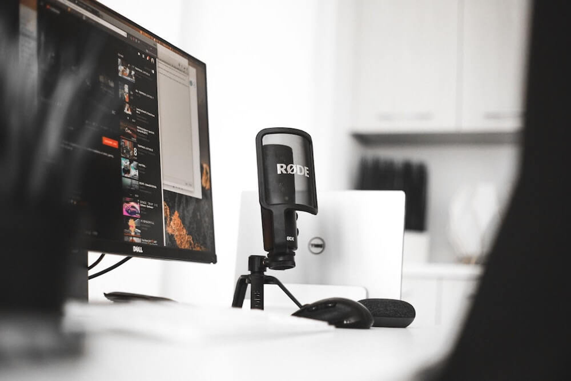 Computer monitor and podcast microphone with pop filter