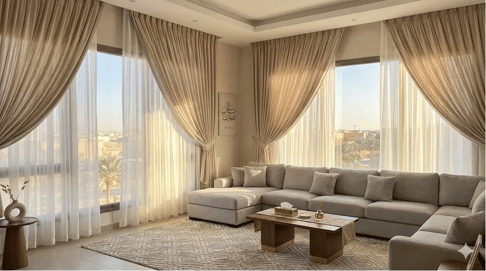 Modern living room with floor to ceiling custom curtains in Riyadh