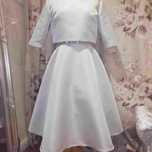 Designer mother of the bride dress. Soft duck egg dress and jacket. Made to measure in Glasgow