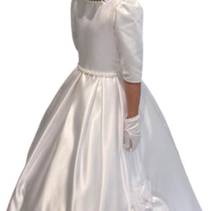 Classic duchesse satin first holy communion dress with pearl detail adorning neckline, waistline and feature big bow. Made in Glasgow