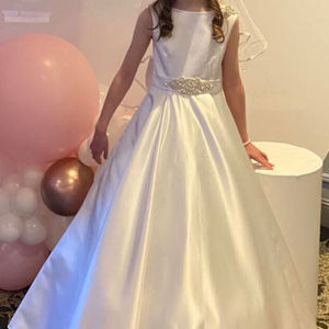 Duchesse satin first holy communion dress with diamonte/ pearl detail on shoulder,belt and feature bow. Made in Glasgow