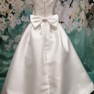 First holy Communion dress V-neck with statement bow. Made to measure in Glasgow