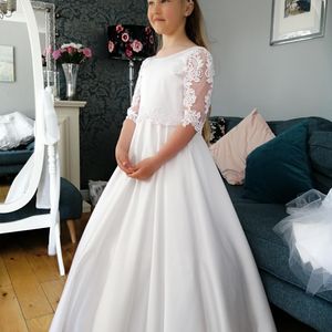 duchess communion gown with soft tulle three quarter length sleeves. Made to measure in Glasgow