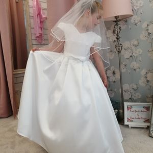 First holy Communion dress 50's inspired micado dress with v-neck, pleated cap sleeve and skirt. Made to order in Glasgow