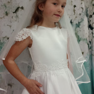 Duchesse satin first holy communion dress with beautiful beaded lace on sleeves, waist and  bow with pretty satin buttons on back. Made in Glasgow