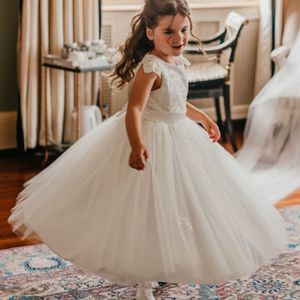 Flowergirl dress. Beaded tulle bodice/ cap sleeve  with soft tulle skirt made to measure in Glasgow