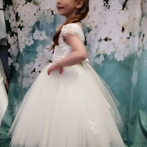 Ivory beaded tulle bodice with cal sleeve, full tulle skirt flower girl dress. Made to measure in Glasgow