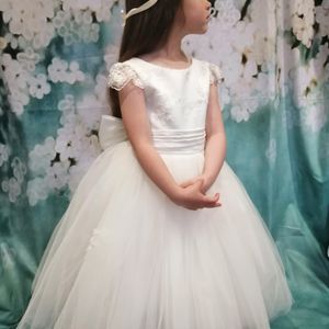 Ivory beaded tulle bodice with cal sleeve, full tulle skirt flower girl dress. Made to measure in Glasgow