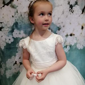 Ivory beaded bodice, cap sleeve with full tulle skirt flower girl dress. Made to measure in Glasgow