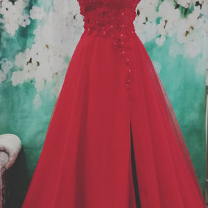 Beautiful beaded boned bodice red prom dress with soft tulle skirt & split. Made to measure in Glasgow