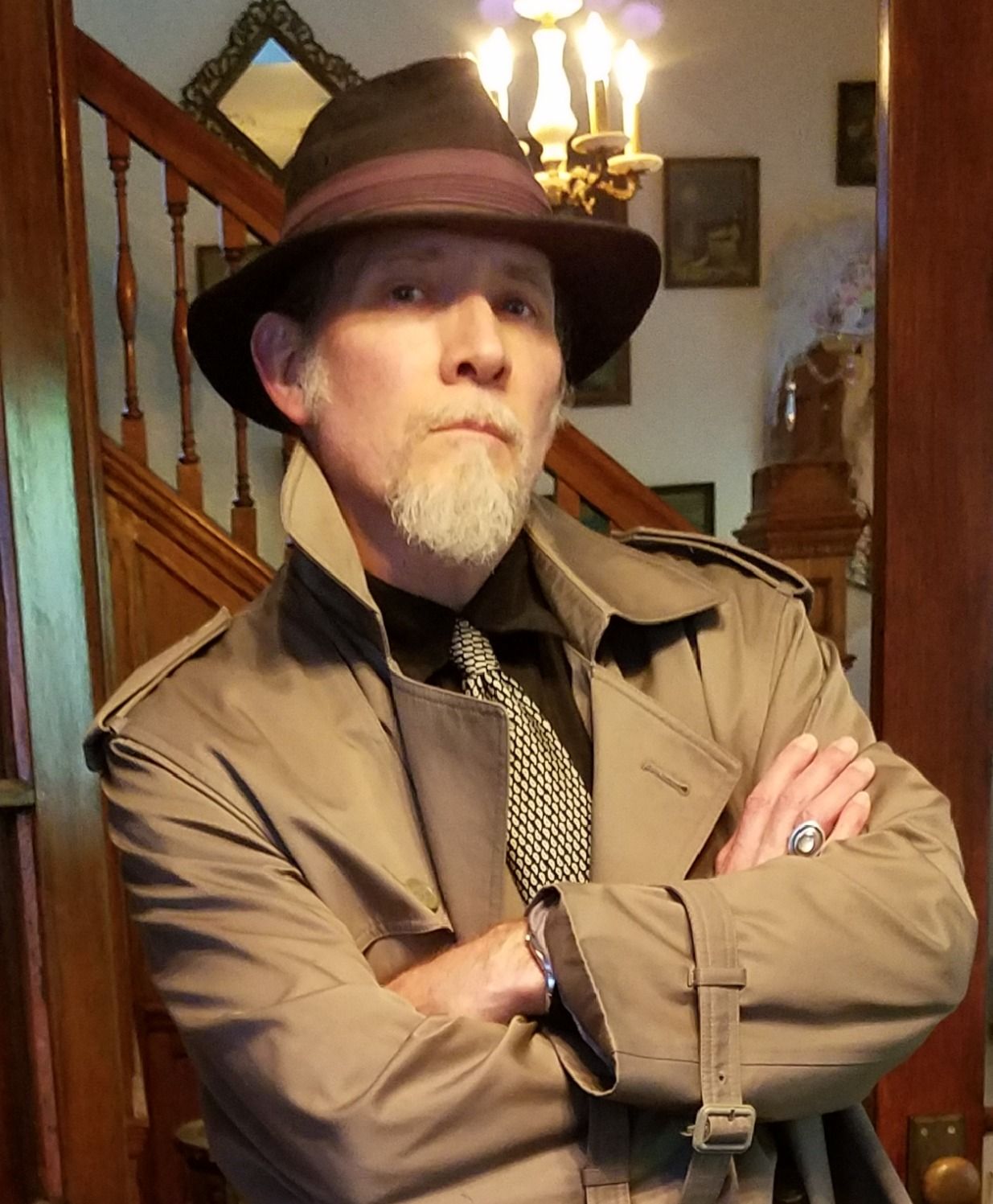 The fedora, the overcoat...Hey, H.B. means something beyond Humphrey Bogart!
