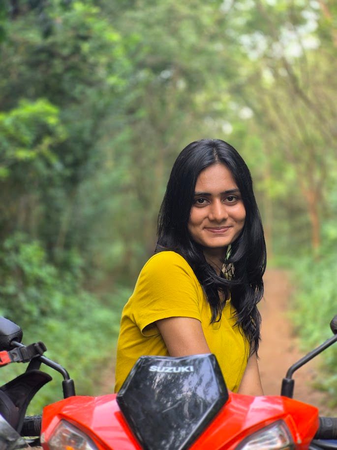 Meenal in yellow t-shirt