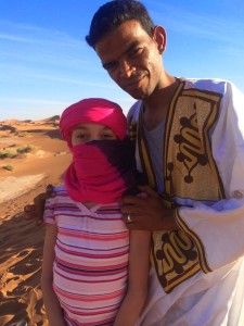 Preparing for a camel ride in Chegga, Morocco 