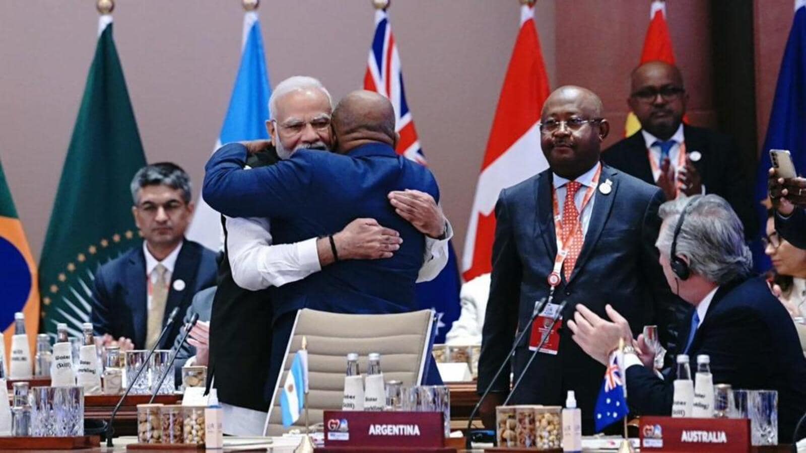 Modi gives the African Union a bear hug after it was accepted as a permanent member of the G20.