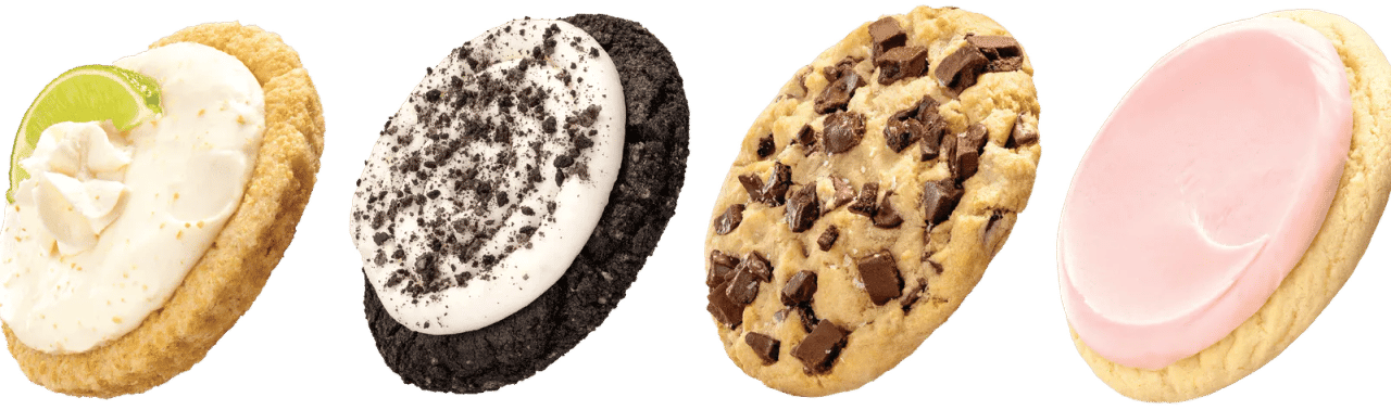 Four Crumbl cookies in pink, oreo, chocolate chip, and lemon flavors