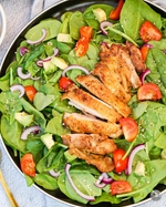 spring chicken, avocado, tomato, and spinach salad