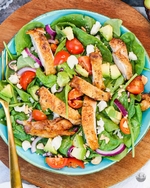 spring chicken, avocado, tomato, and spinach salad