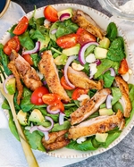 spring chicken, avocado, tomato, and spinach salad