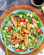 spring chicken, avocado, tomato, and spinach salad