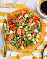 spring chicken, avocado, tomato, and spinach salad