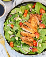 spring chicken, avocado, tomato, and spinach salad