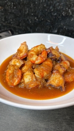 prawns and octopus with onion sauce