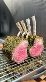 herb-crusted rack of lamb with confit garlic mashed potato and bordelaise sauce