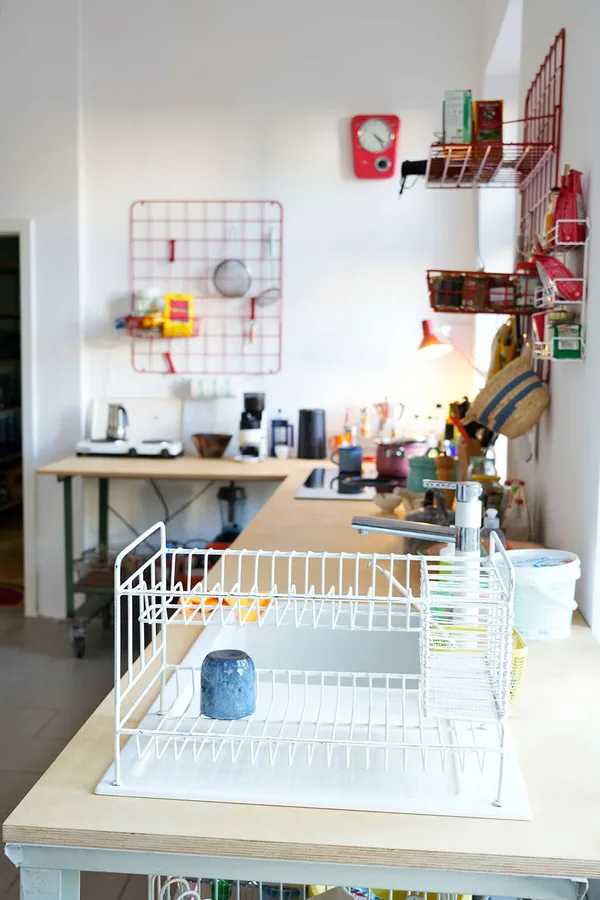 Kitchen counter with ceramic sing at KOTEKA Coworking Leipzig